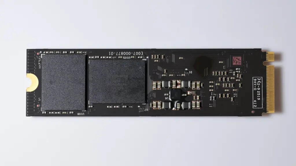 A Western Digital SN850X 8TB NVME solid state drive. Although difficult to read, the flash ICs say Sandisk on
